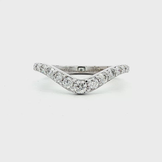14K White gold curved diamond band set with round brilliant diamonds. Item J38574 - ABC Jewelry Co. 
