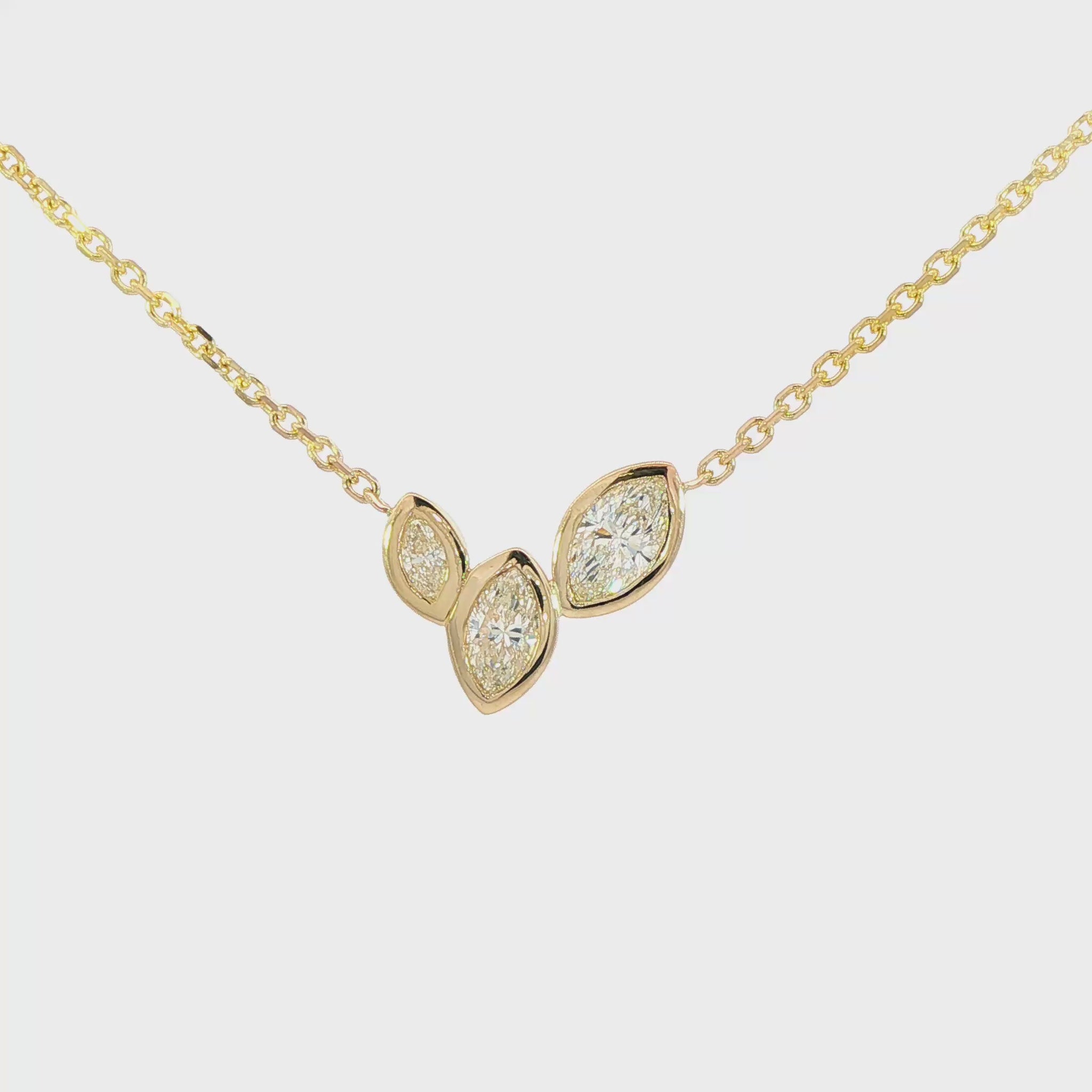 14K Yellow gold necklace set with three marquise diamonds. Item J38865 - ABC Jewelry Co. 