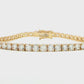 14K Yellow gold tennis bracelet set with round brilliant diamonds. Item J38986 - ABC Jewelry Co. 