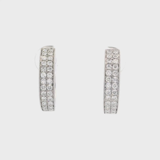 14K White gold diamond pave oval hoop earrings. Item J34762 - ABC Jewelry Co