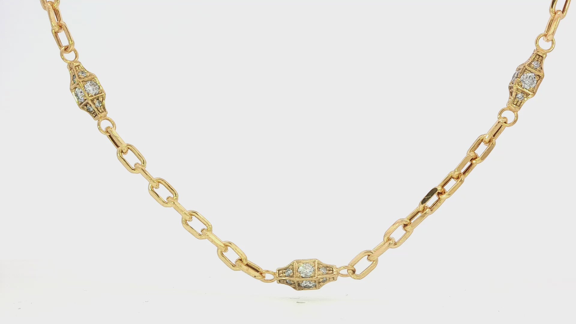 14K Yellow gold link necklace with diamond set charms. Item 22155 - ABC Jewelry Co.