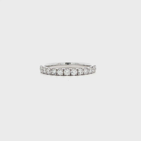 14K White gold band set with round brilliant diamonds. Item J39115 - ABC Jewelry Co.