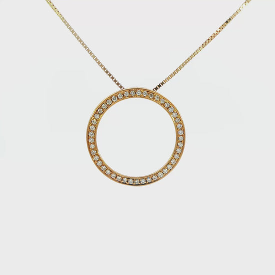 18K Yellow gold circular pendant set with diamonds. Item J37716 - ABC Jewelry Co.