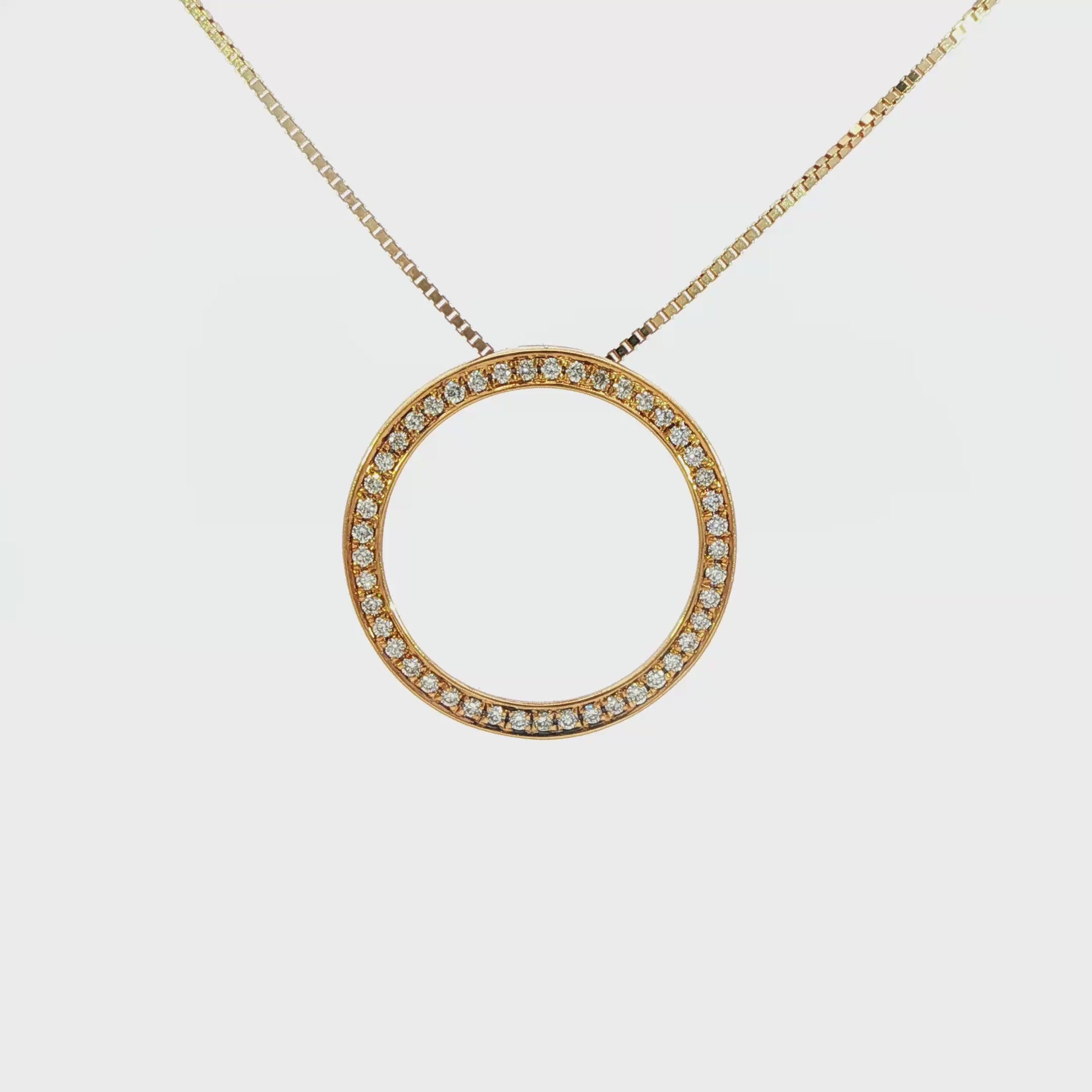 18K Yellow gold circular pendant set with diamonds. Item J37716 - ABC Jewelry Co.