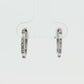 14K White gold hoop earrings set with baguette diamonds and round brilliant diamonds. Item J35473 - ABC Jewelry Co.