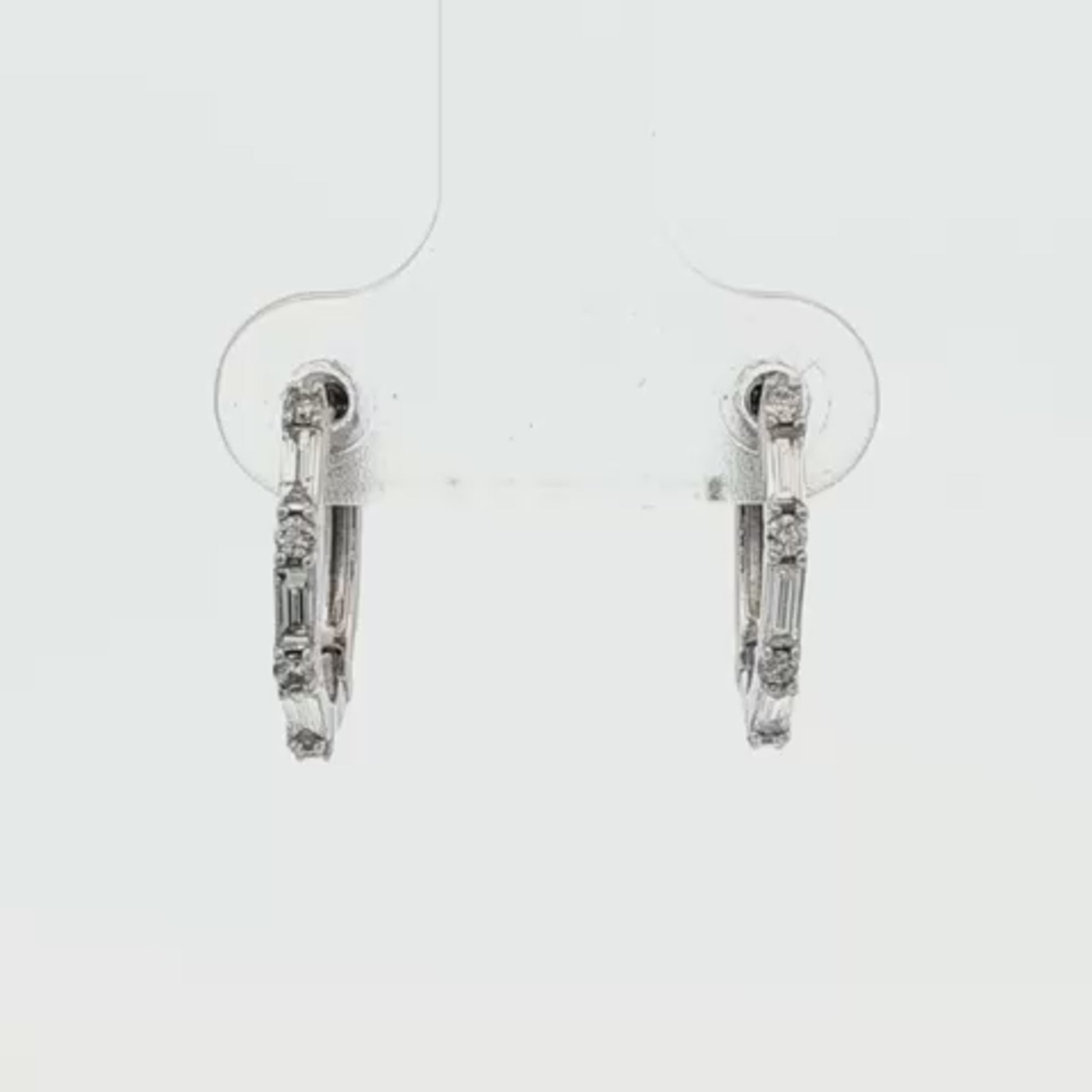 14K White gold hoop earrings set with baguette diamonds and round brilliant diamonds. Item J35473 - ABC Jewelry Co.