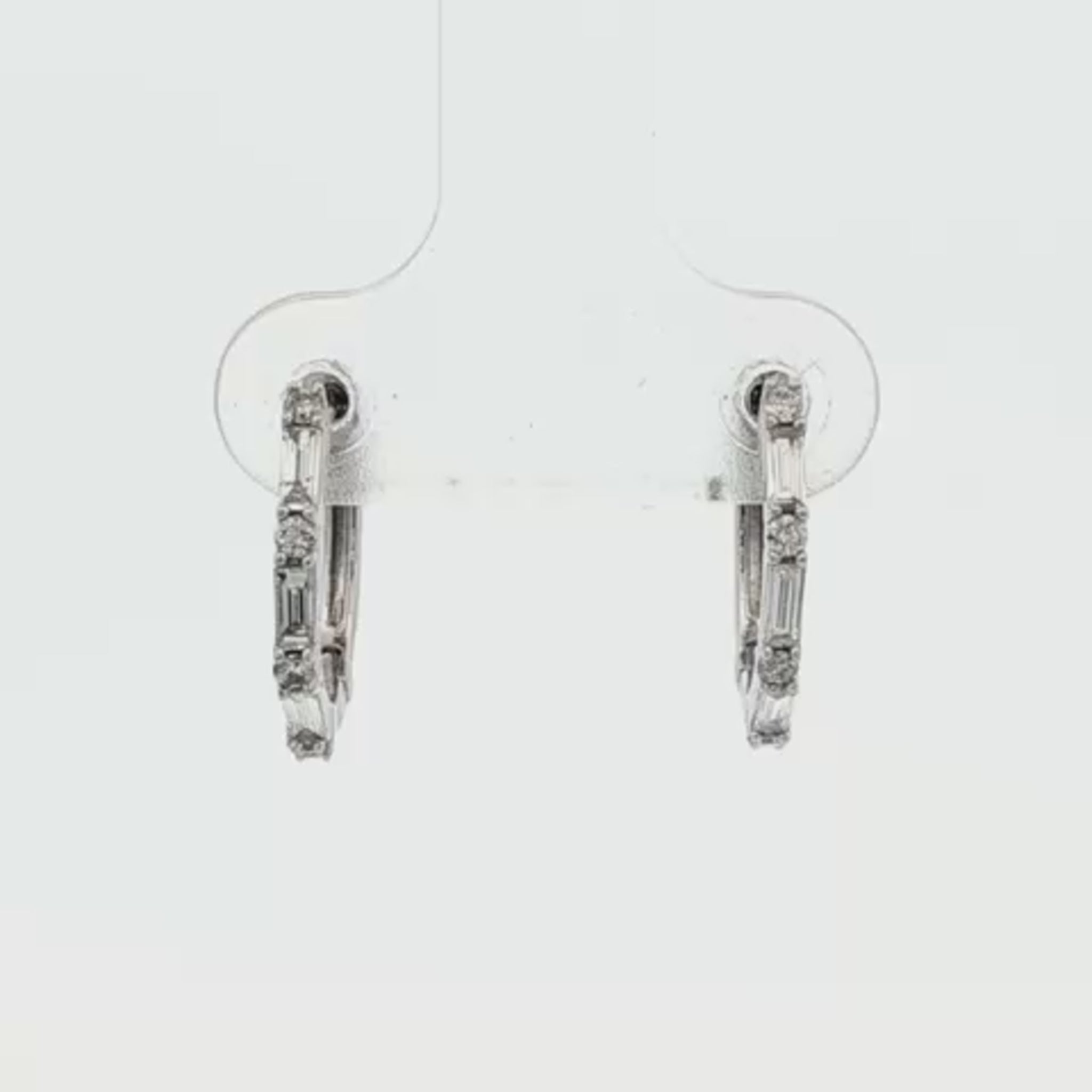 14K White gold hoop earrings set with baguette diamonds and round brilliant diamonds. Item J35473 - ABC Jewelry Co.
