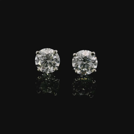 14K White gold studs set with round brilliant diamonds. Item J37908 - ABC Jewelry Co. 