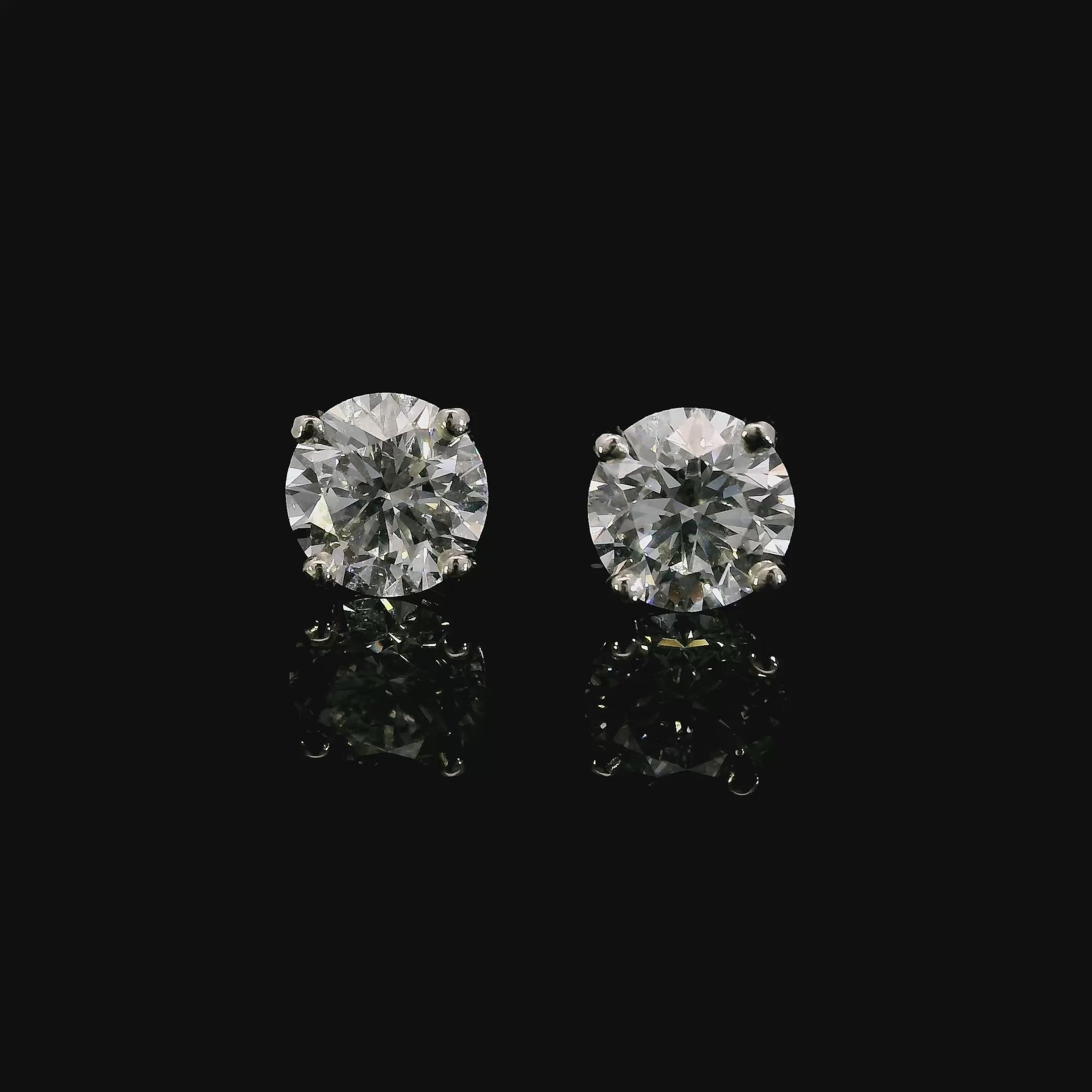 14K White gold studs set with round brilliant diamonds. Item J37908 - ABC Jewelry Co. 