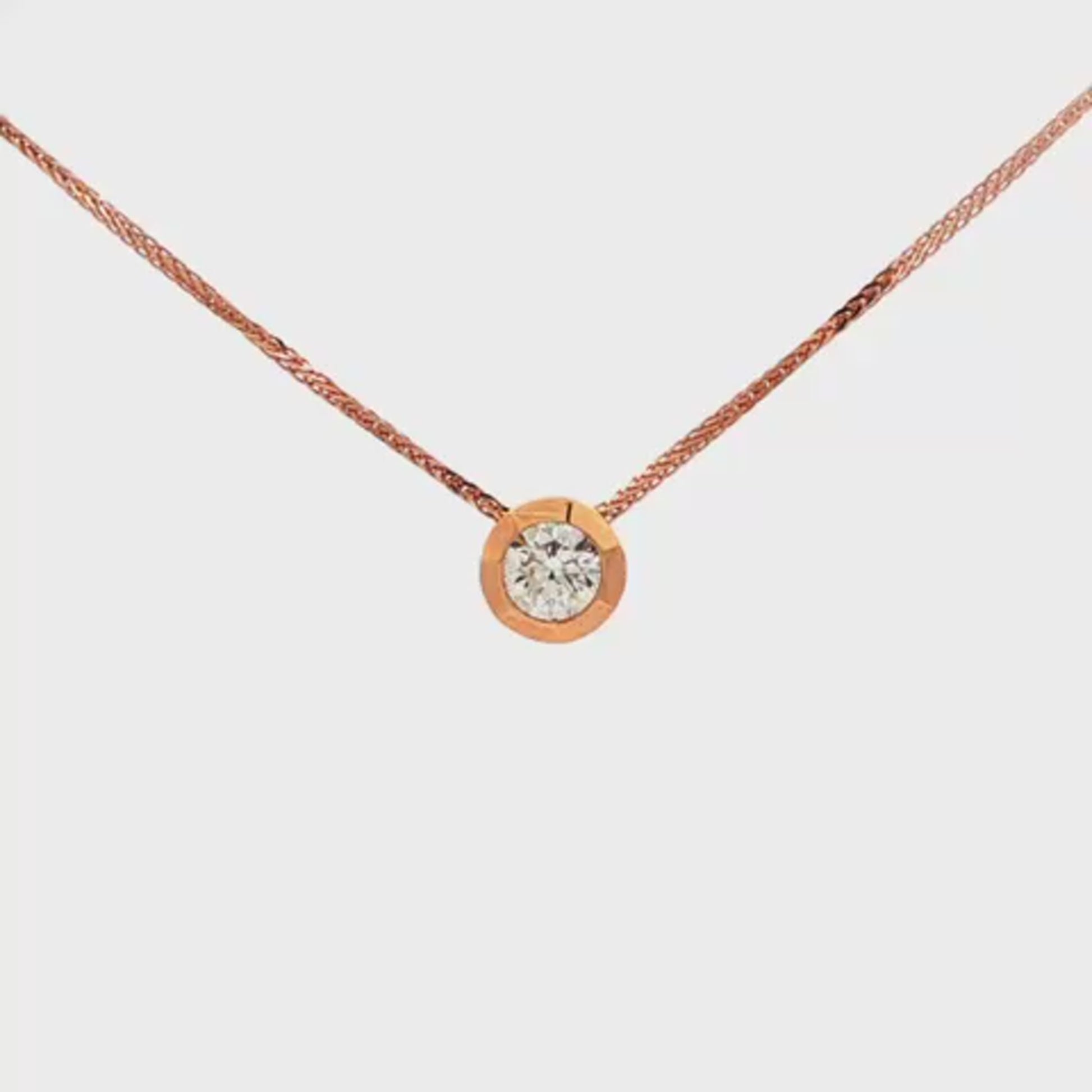 14K Rose gold solitaire necklace set with a round brilliant diamond. Item 24495 - ABC Jewelry Co