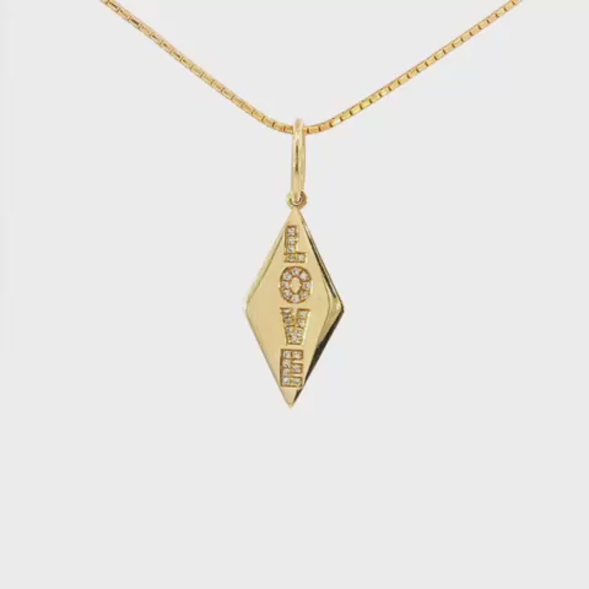14K Yellow gold "Love" pendant with single cut diamonds set into each letter. Item J35470 - ABC Jewelry Co.