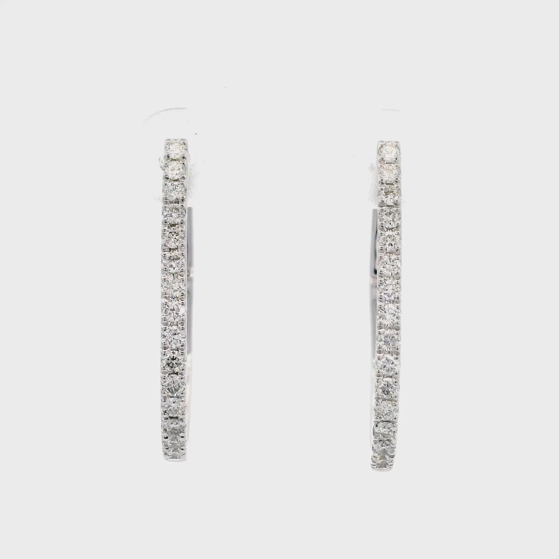 18K White gold oval hoop earrings set with natural mined diamonds, item J37696 - ABC Jewelry Co