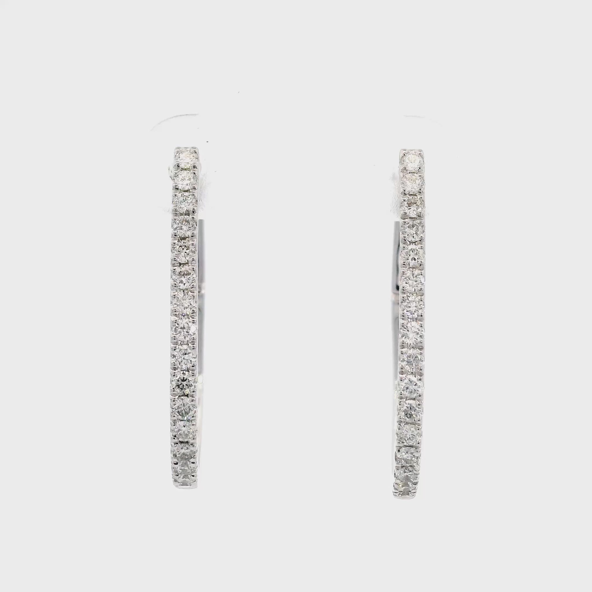 18K White gold oval hoop earrings set with natural mined diamonds, item J37696 - ABC Jewelry Co