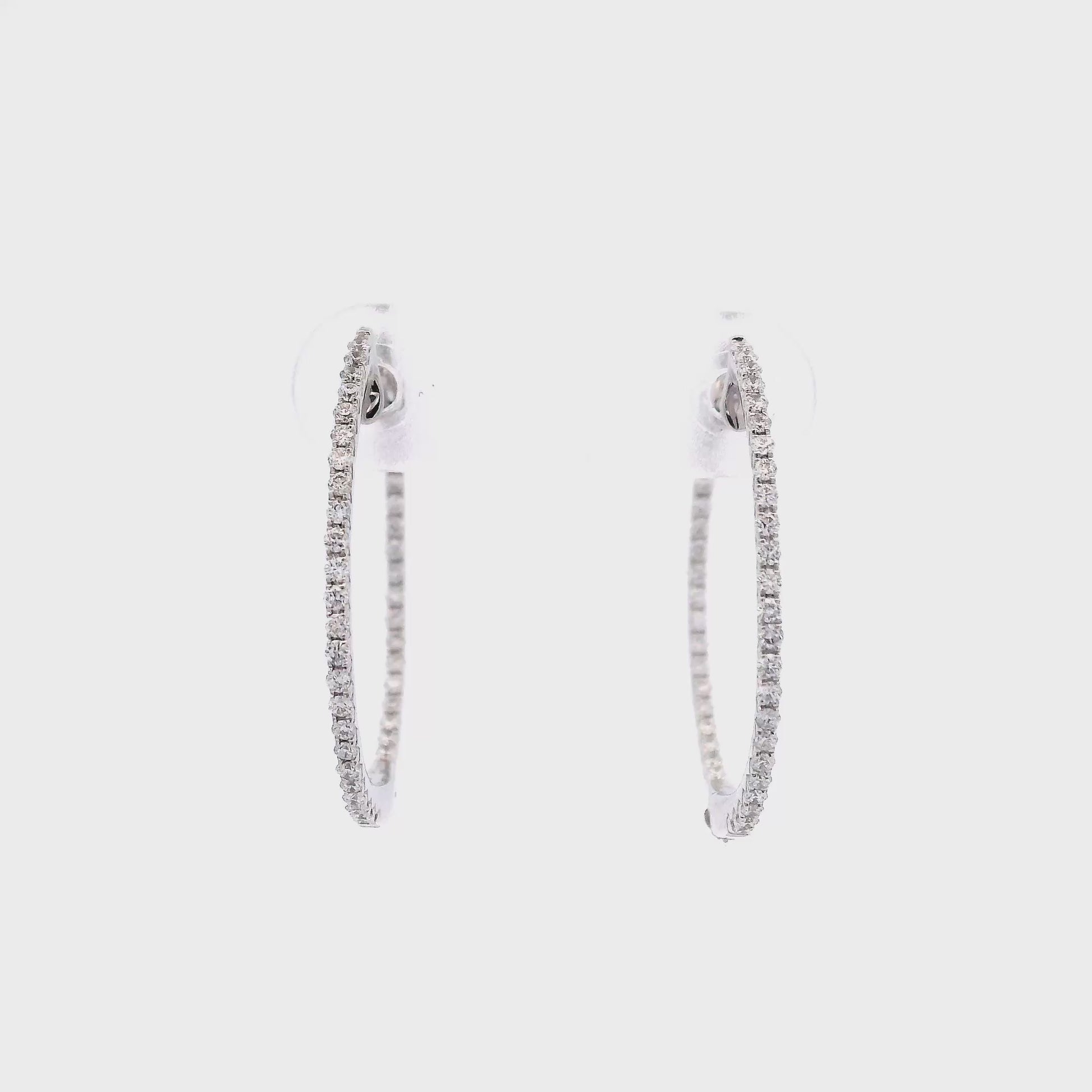 14K White gold slim hoop earrings set with round brilliant diamonds - item J34455, ABC Jewelry Co. 
