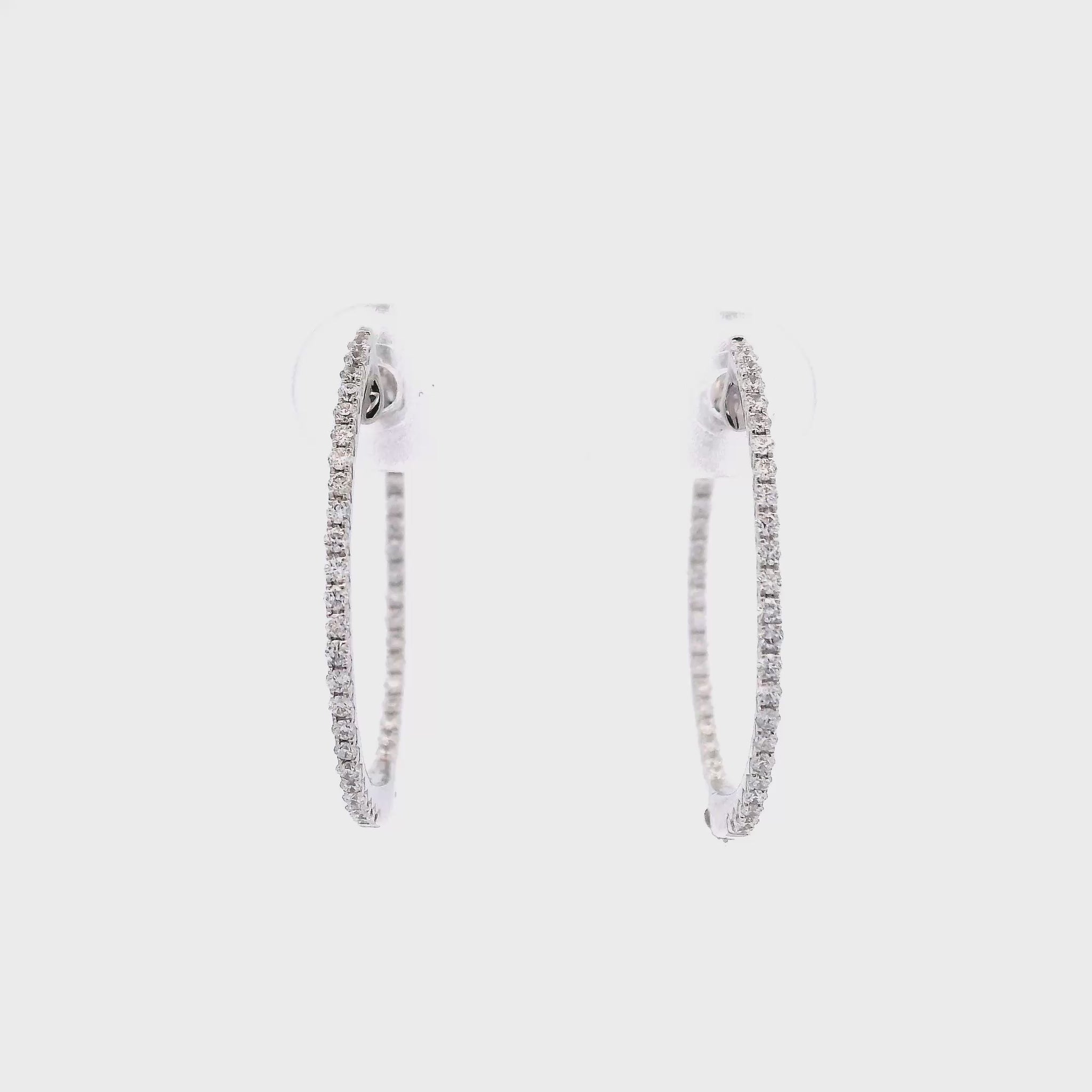 14K White gold slim hoop earrings set with round brilliant diamonds - item J34455, ABC Jewelry Co. 