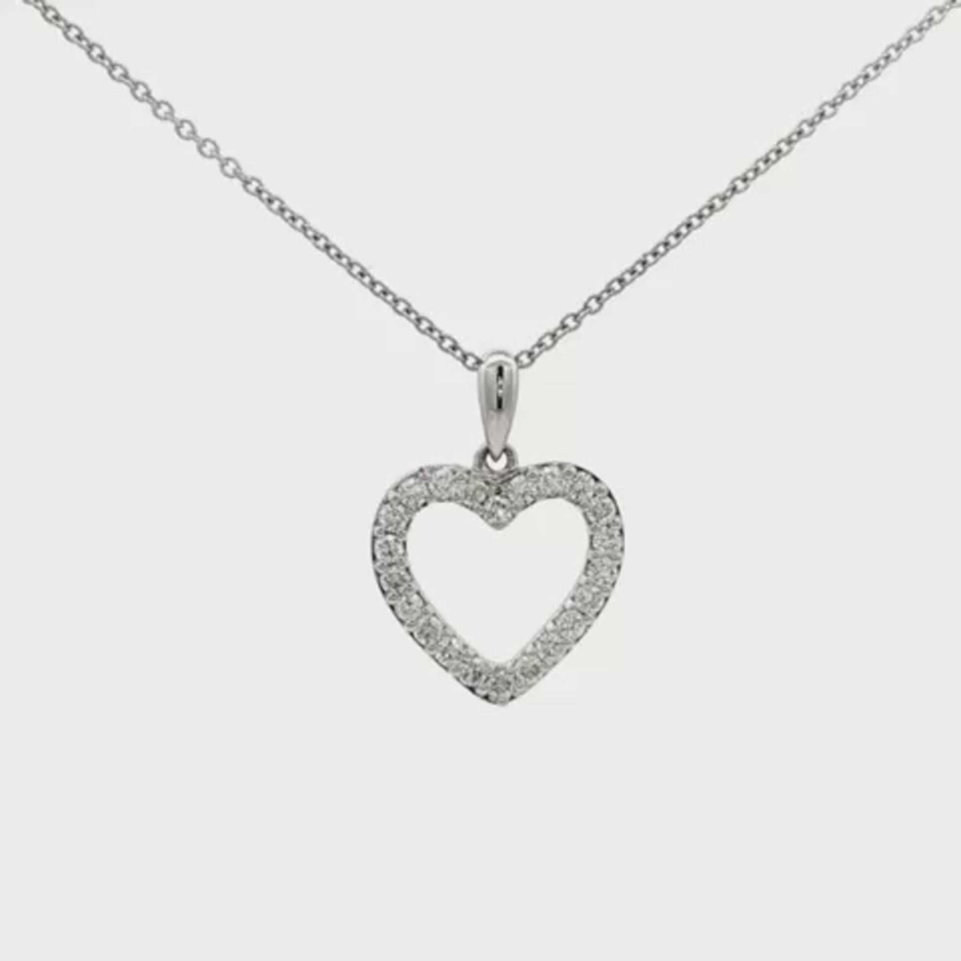 14K White gold necklace with diamond set heart pendant. Item J37962 - ABC Jewelry Co. 