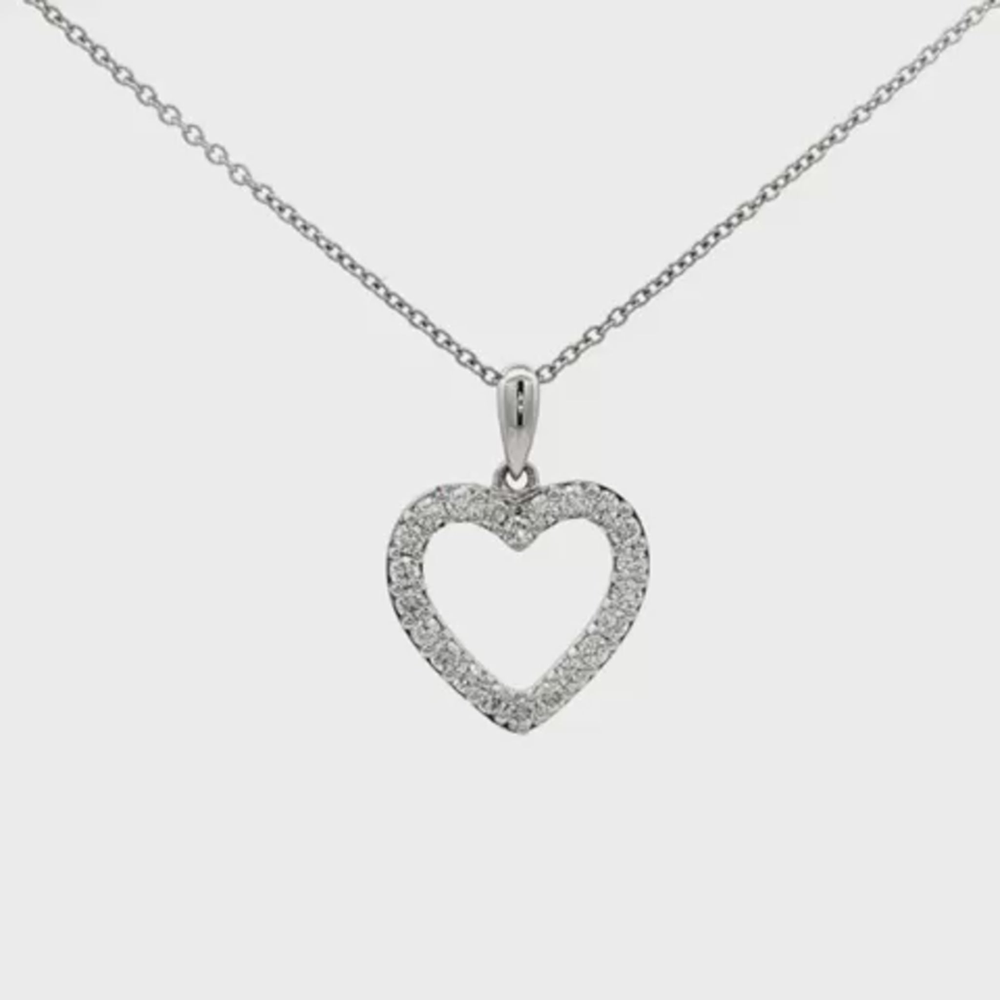 14K White gold necklace with diamond set heart pendant. Item J37962 - ABC Jewelry Co. 