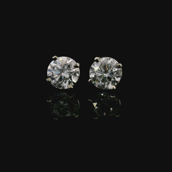 14K White gold studs set with round brilliant diamonds. Item J38143 - ABC Jewelry Co. 
