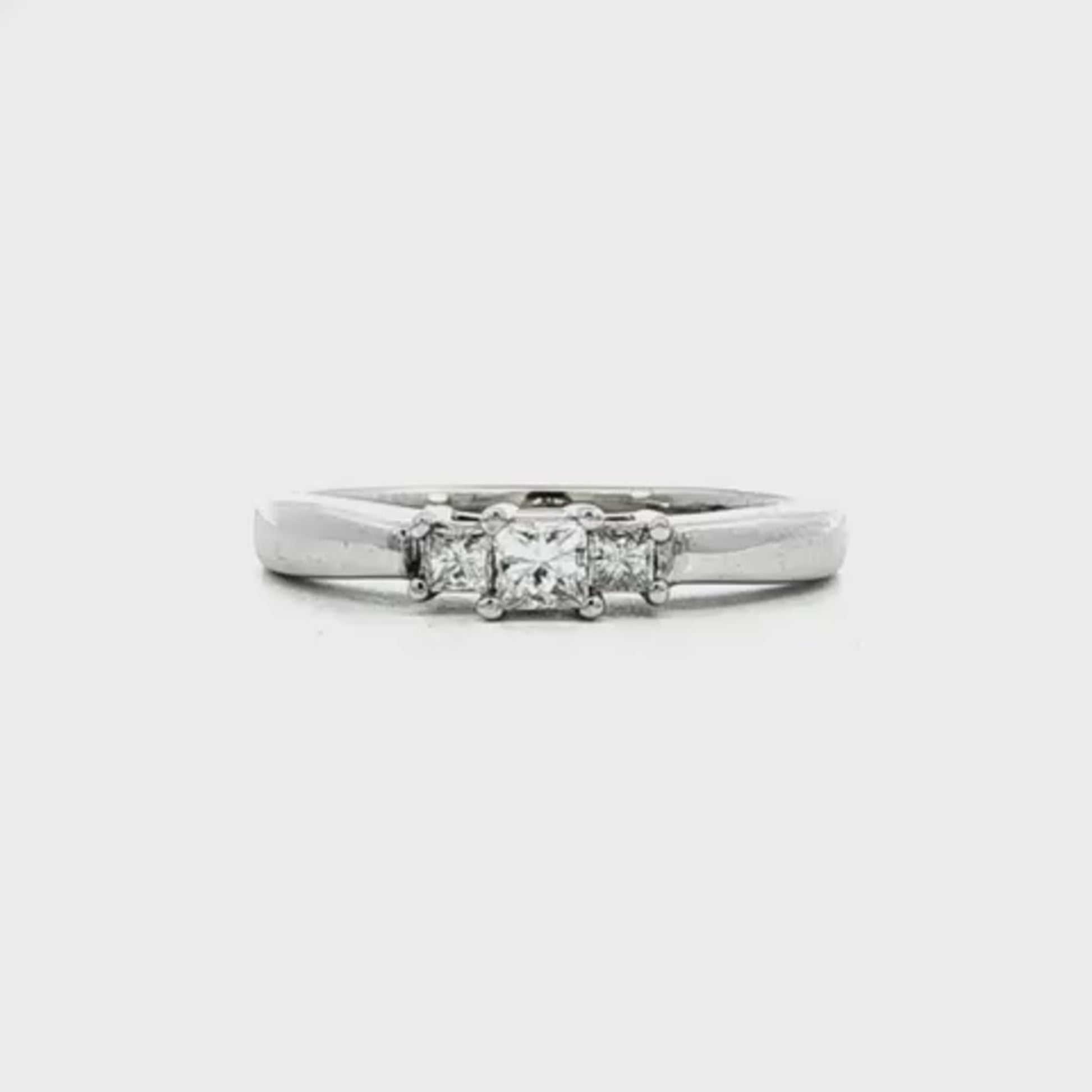 14K White gold ring set with 3 princess cut diamonds. Item 13442 - ABC Jewelry Co