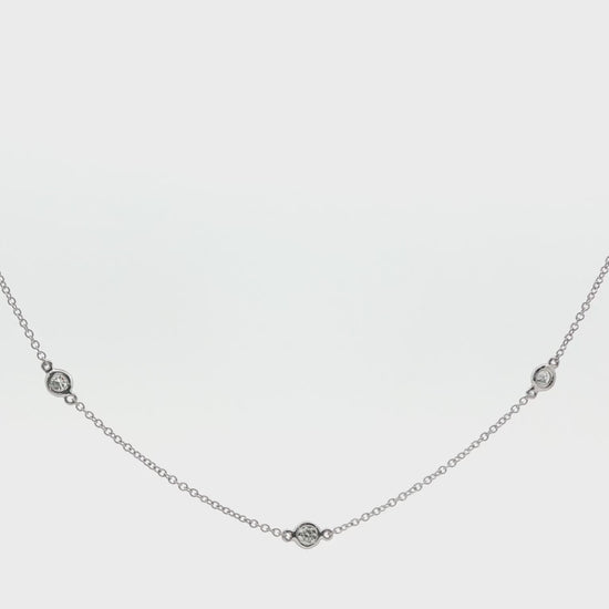 18K White gold necklace with bezel set diamonds bezel set along the chain. Item J38857 - ABC Jewelry Co. 