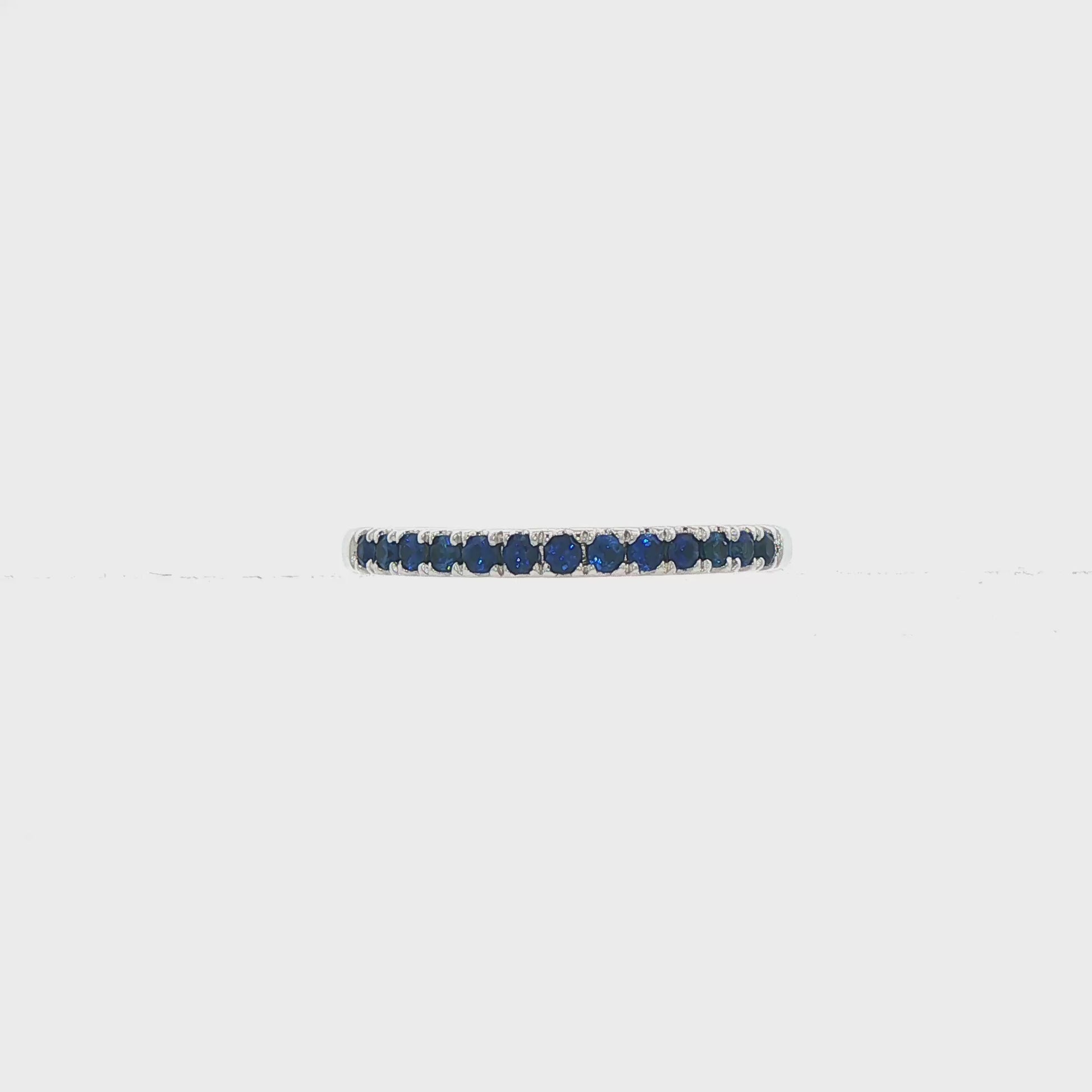 18K White gold band set with blue sapphires. Item J36901 - ABC Jewelry Co. 