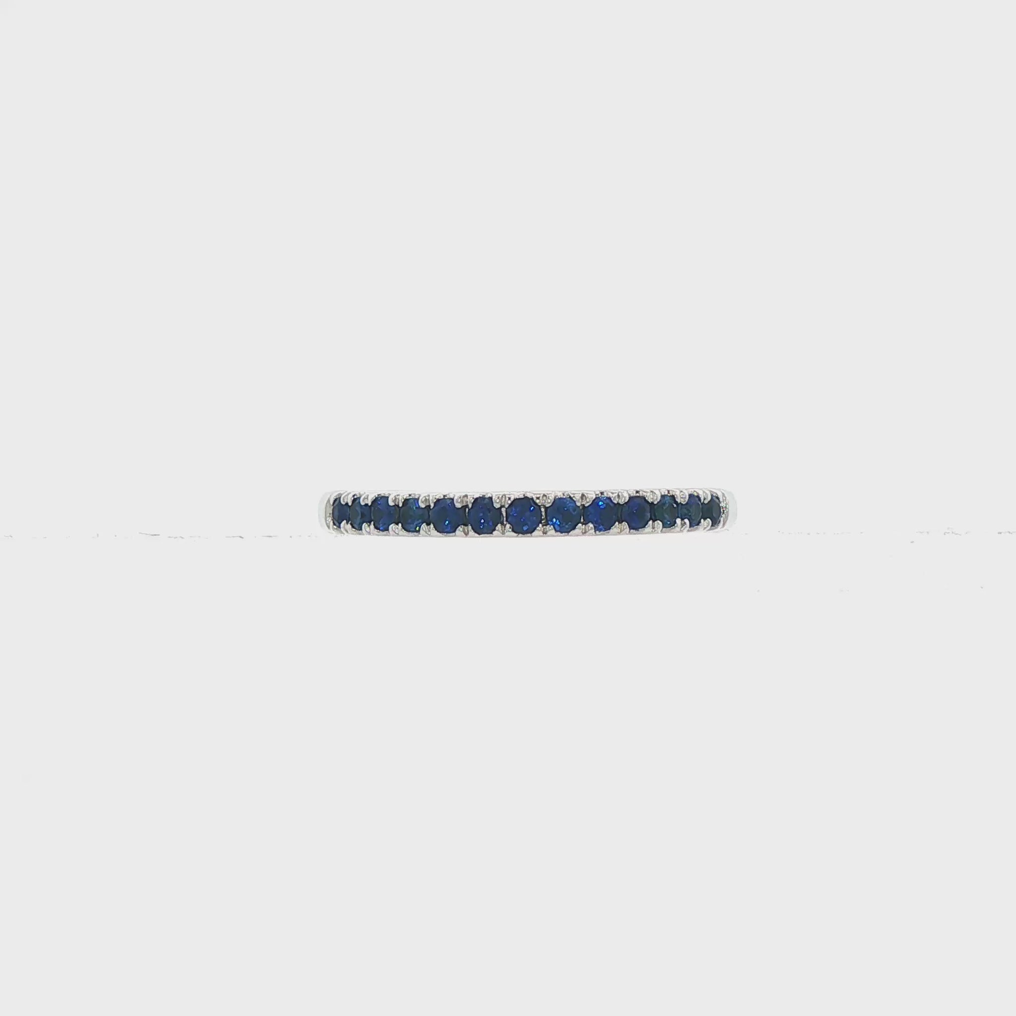 18K White gold band set with blue sapphires. Item J36901 - ABC Jewelry Co. 