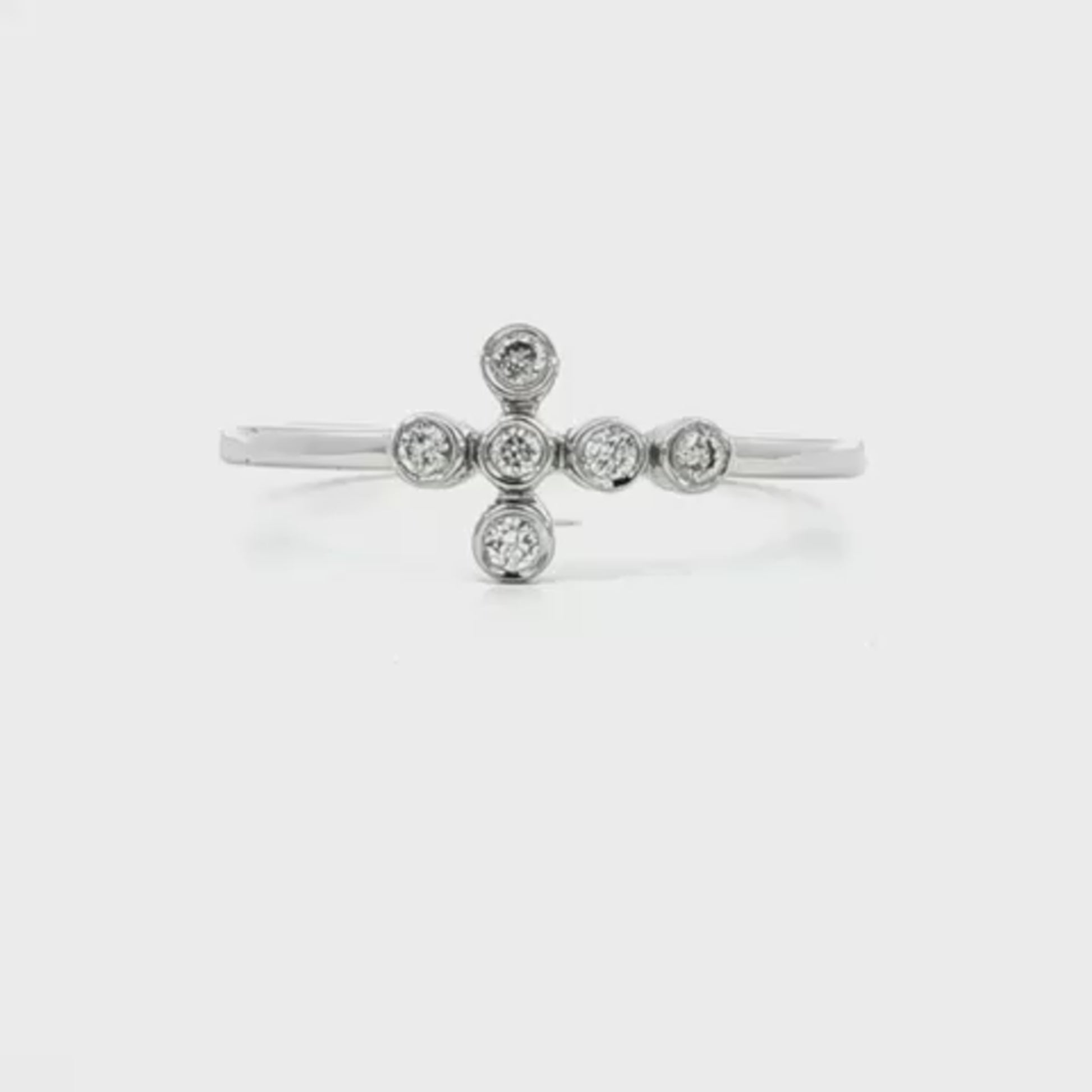 14K White gold ring with asymmetrical bezel set round diamonds. Item J34457 - ABC Jewelry Co