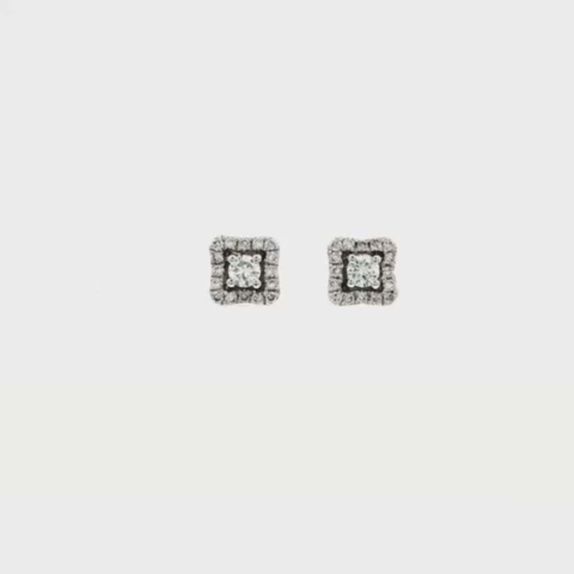 14K White gold diamond earrings set with a round brilliant center and square halo of round diamonds. Item 24903 - ABC Jewelry Co.
