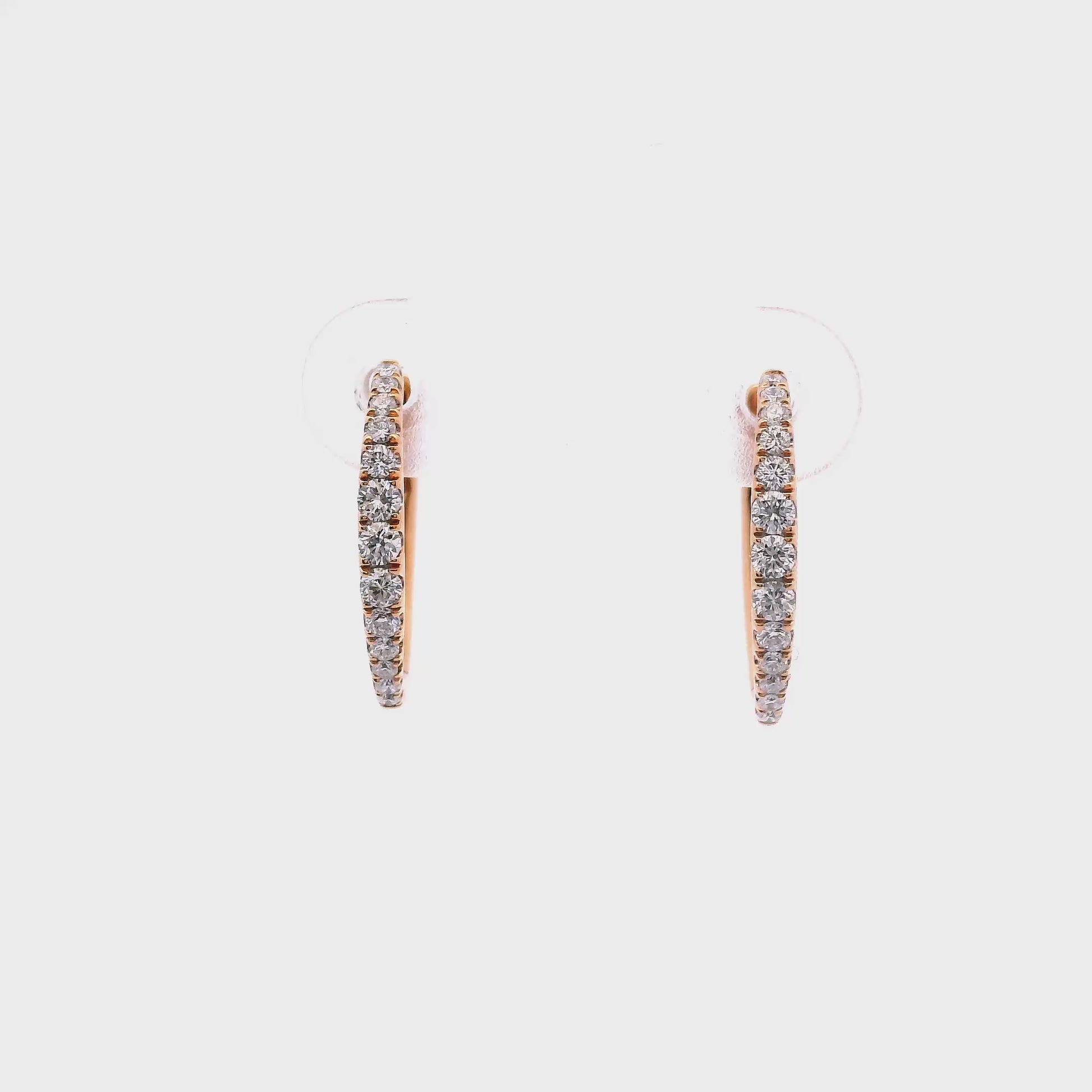 18K Rose gold hoop earrings set with round brilliant diamonds. Item 24948 - ABC Jewelry Co