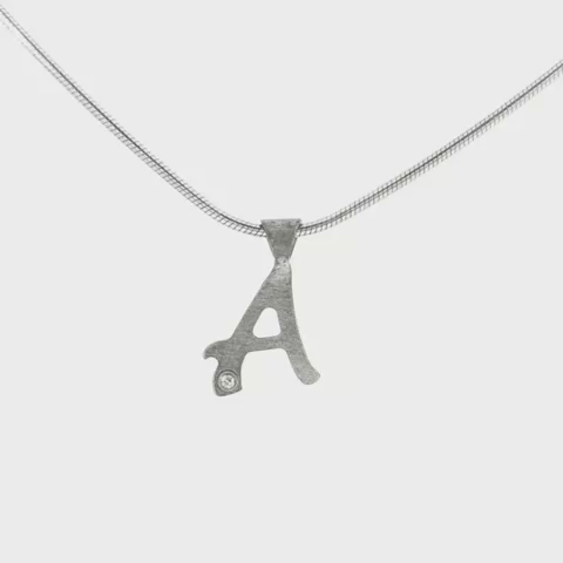 Sterling silver necklace with initial "A" pendant, set with 1 round brilliant diamond. Item 21189 - ABC Jewelry Co.