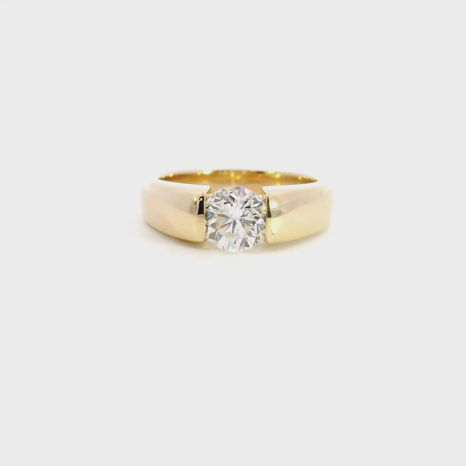 14K Yellow gold solitaire ring set with thick band, set with round brilliant diamond - item J38489, ABC Jewelry Co. 