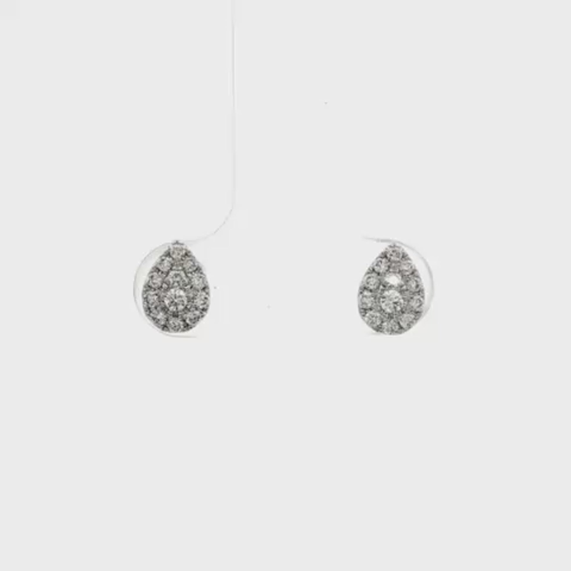 14K White gold earrings set with round brilliant diamonds set in a pear shape setting. Item J32154 - ABC Jewelry Co. 