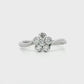 18K White gold diamond cluster ring in floral design with bypass style shank. Item J33161 - ABC Jewelry Co