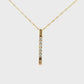 14K Yellow gold bar pendant necklace set with 6 round brilliant diamonds. Item J37535 - ABC Jewelry Co. 