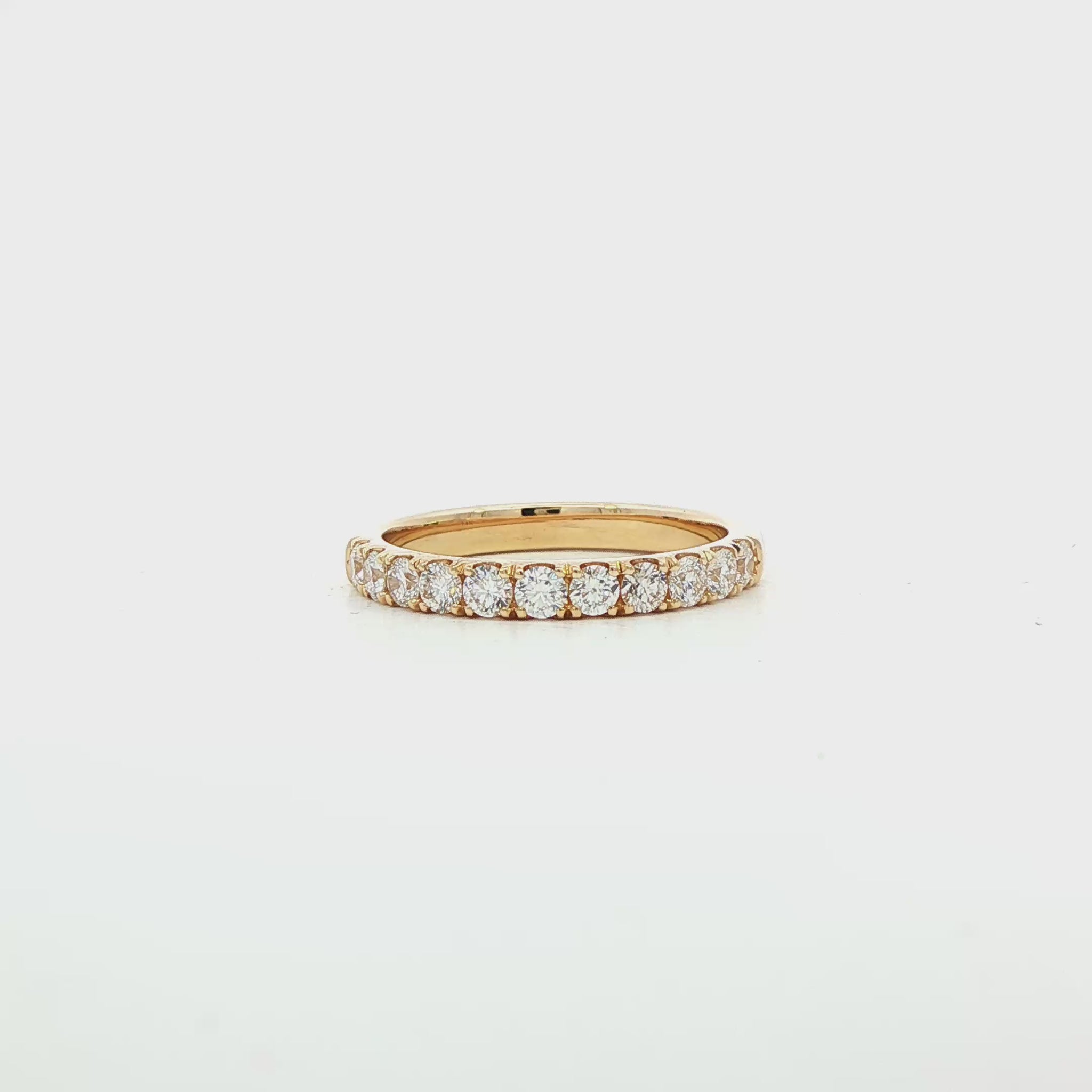 14K Yellow gold band set with round brilliant diamonds. Item J39113 - ABC Jewelry Co.