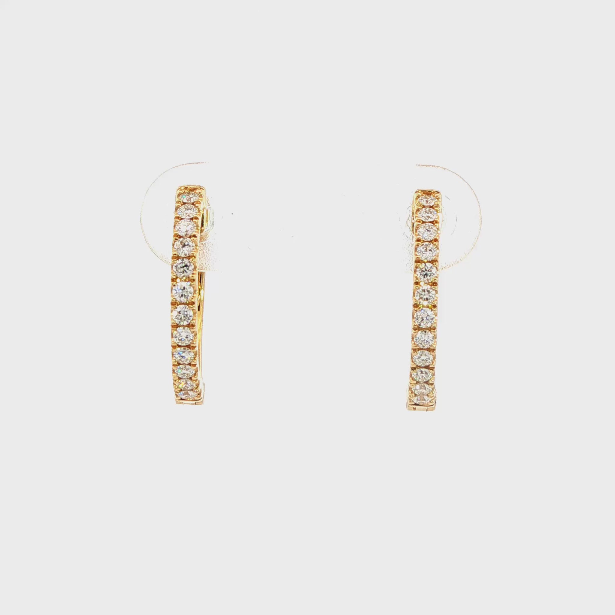 14K Yellow gold hoop earrings set with round brilliant diamonds. Item J38770 - ABC Jewelry Co. 